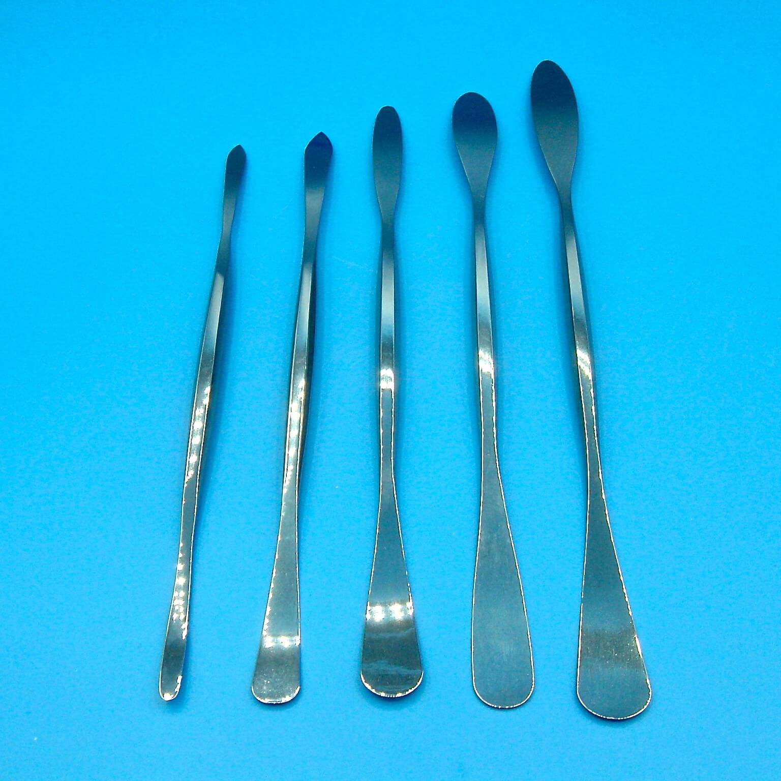 Spatola doppia foglia curva INOX